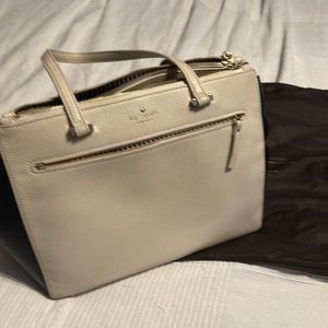 Preppy chic Kate Spade black & white classic three compartment bag.